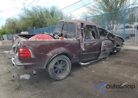 2001 Ford F150 Supercrew z USA, uszkodzony, nr VIN 1FTRW08L31KE43205